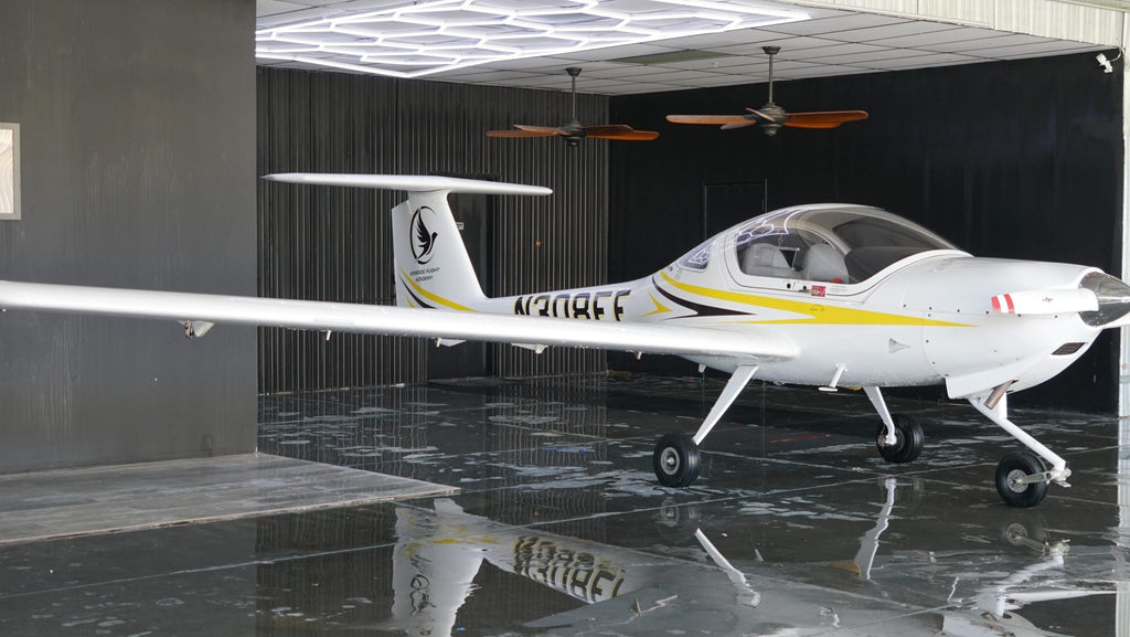 Two-seat light trainer with instructor at Van Nuys Airport — Sport Pilot License course